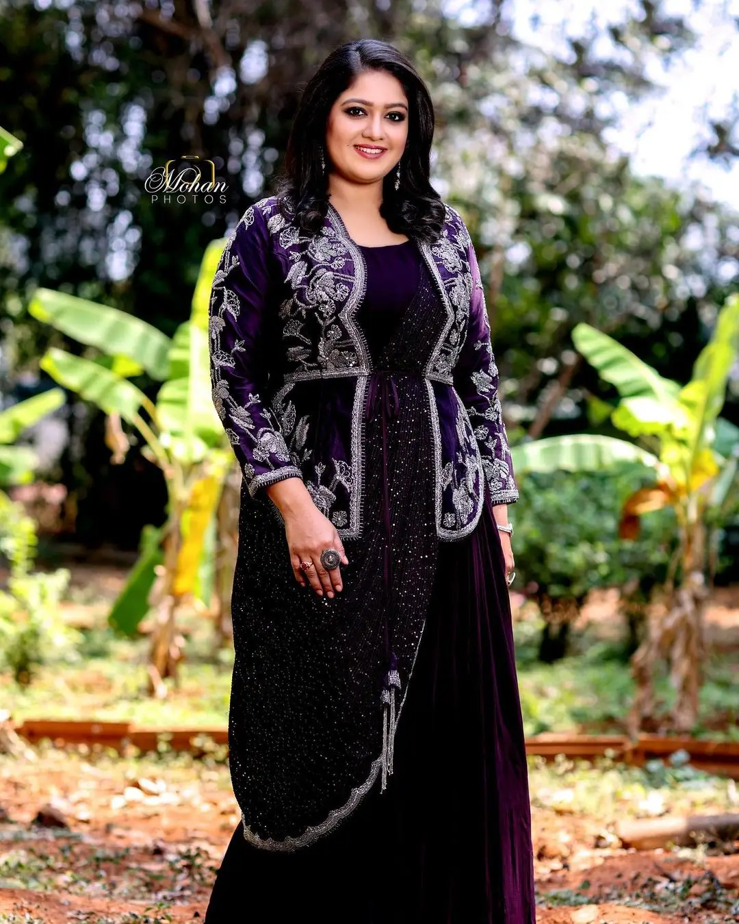 Meghana Raj Wearing Beautiful Earring Black Designer Gown